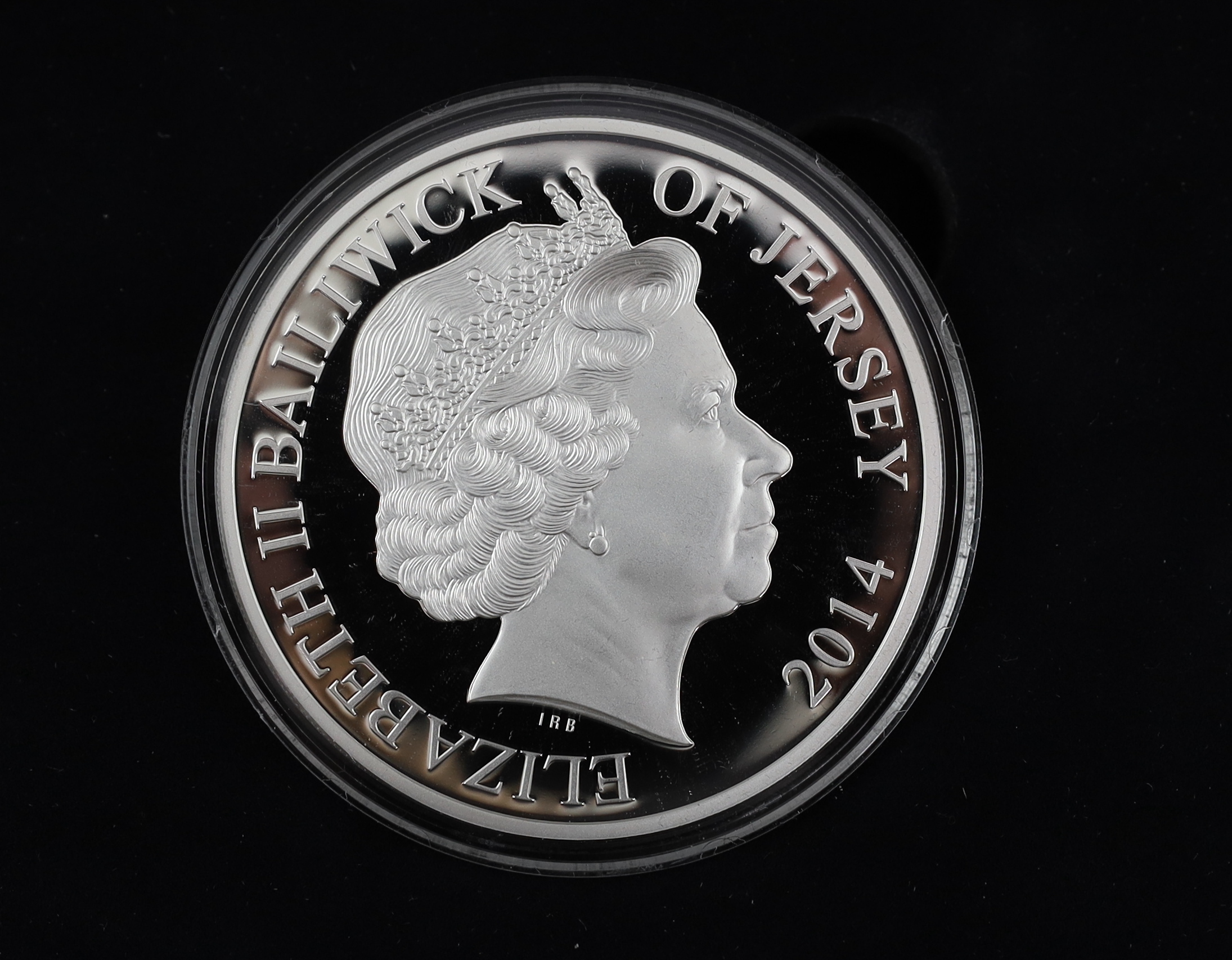 QEII and modern commemorative proof silver coins - Jersey 2014 2oz. ‘100 poppies’ coin, the First World War Centenary 2oz. numisproof, two London Mint 2009 Tristan de Cunha £5 coins, Royal Mint 2009 countdown XXX Olympia